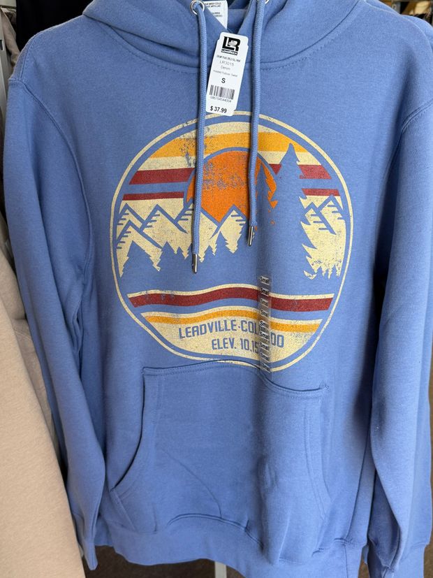 A blue Leadville hoodie with a mountain and sunset design